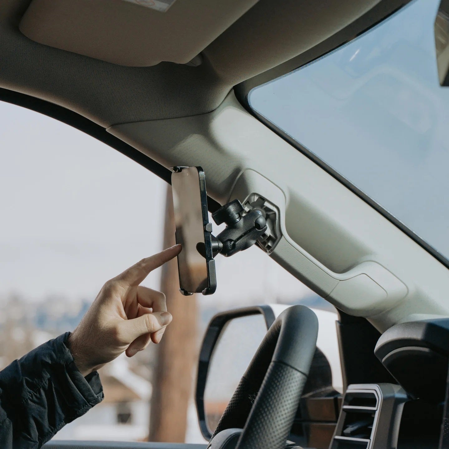 RAM-HOL-AP39U RAM® Form-Fit Cradle for Apple iPhone 13 Pro Max, 14 Plus, 14 Pro Max, 15 Plus and 16 plus in cat with phone