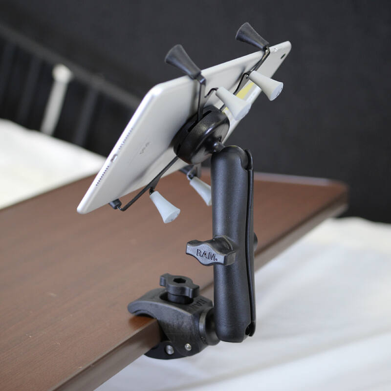 RAM-B-400-C-UN8U RAM® X-Grip® with RAM® Tough-Claw™ Small Mount for 7"-8" Tablets (Long arm) installed on deskop
