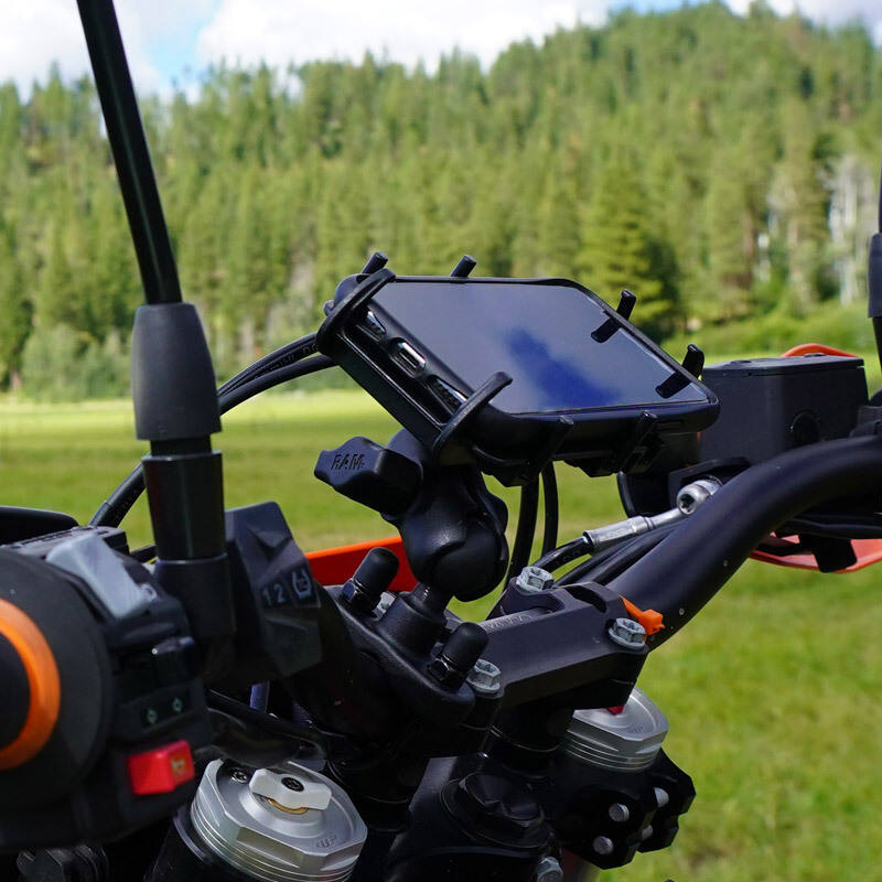 RAM-B-149Z-PD3U RAM® Quick-Grip™ Phone Mount with Handlebar U-Bolt Base installed on handlebars