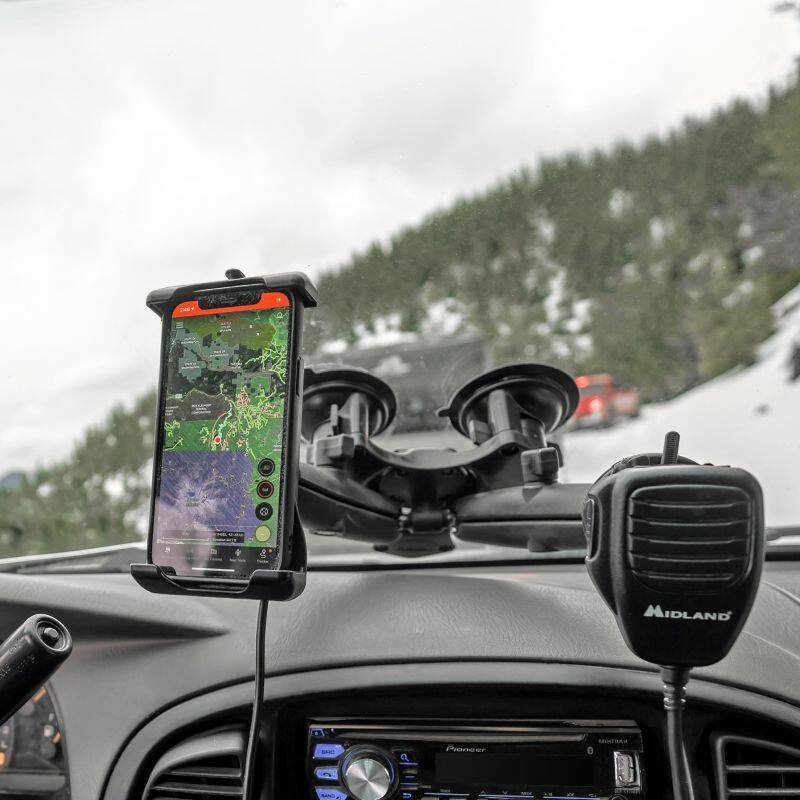 RAP-B-217-365-224-1U RAM® Twist-Lock™ Triple Suction Cup Double Ball Base with arms and cradles installed on vehicle windshield