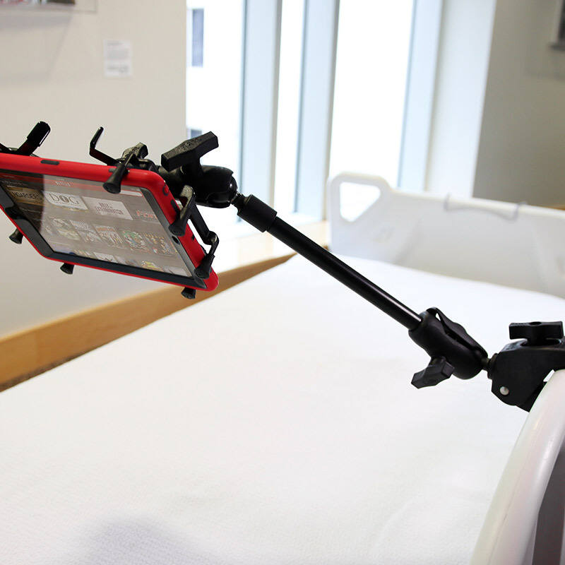 RAP-401-9-BC-UN9U - RAM® X-Grip® with RAM® Tough-Claw™ 9" Pipe Mount for 9"-10" Tablets on bed