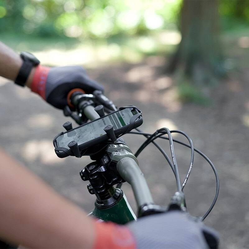 RAP-460-UN7U RAM® X-Grip® Phone Mount with RAM® Tough-Strap™ Handlebar Base on bicycle handlebars