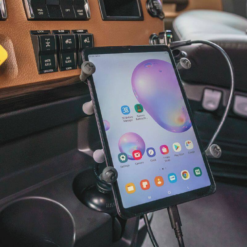 RAP-B-299-4-UN8U RAM® X-Grip® Tablet Mount with RAM® Stubby™ Cup Holder Base installed in truck