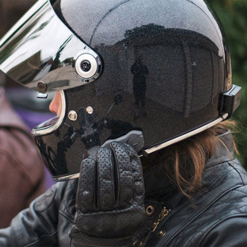 Sena 10R on black motorcycle helmet