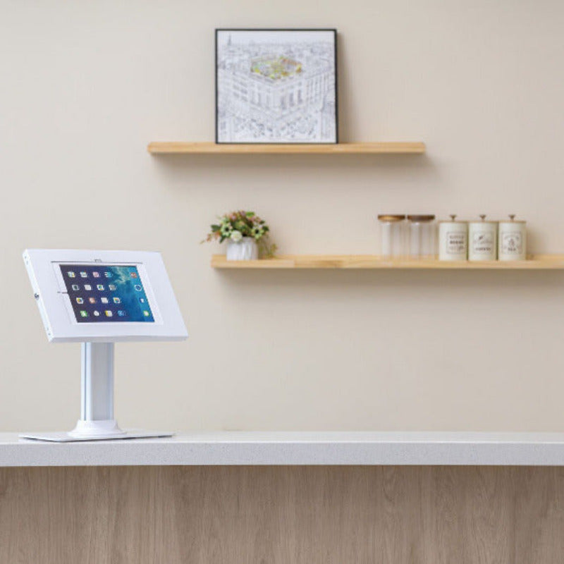 Brateck PAD34-03 countertop tablet kiosk shown in use, matte white