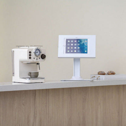 Brateck PAD34-03 anti-theft tablet kiosk in a public countertop setting, matte white